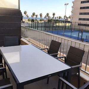 Apartamento Lujo, Primera linea playa, Garaje, Wifi, Piscina climatizada
